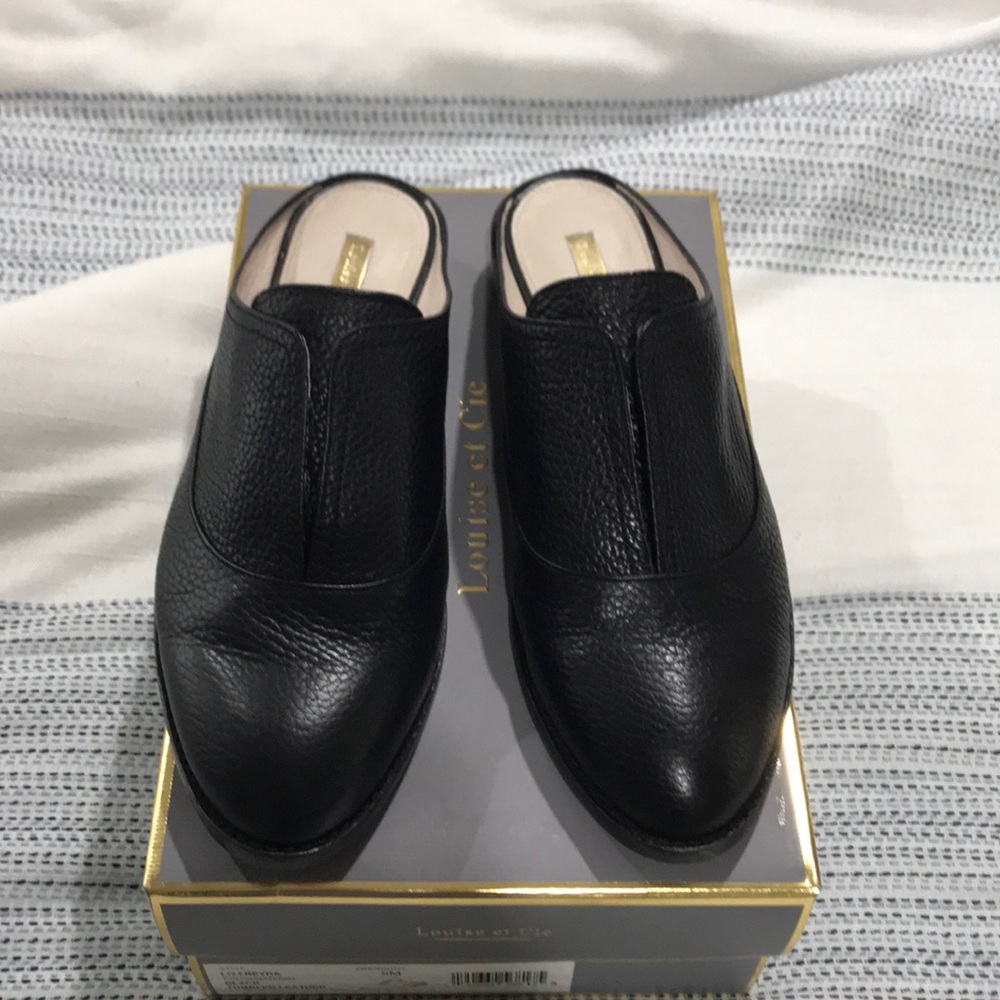 Black slip on loafers, open back